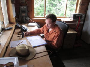 Field Day 2018, Josh reviews text one last time before taking the General test at the summit of Gunstock